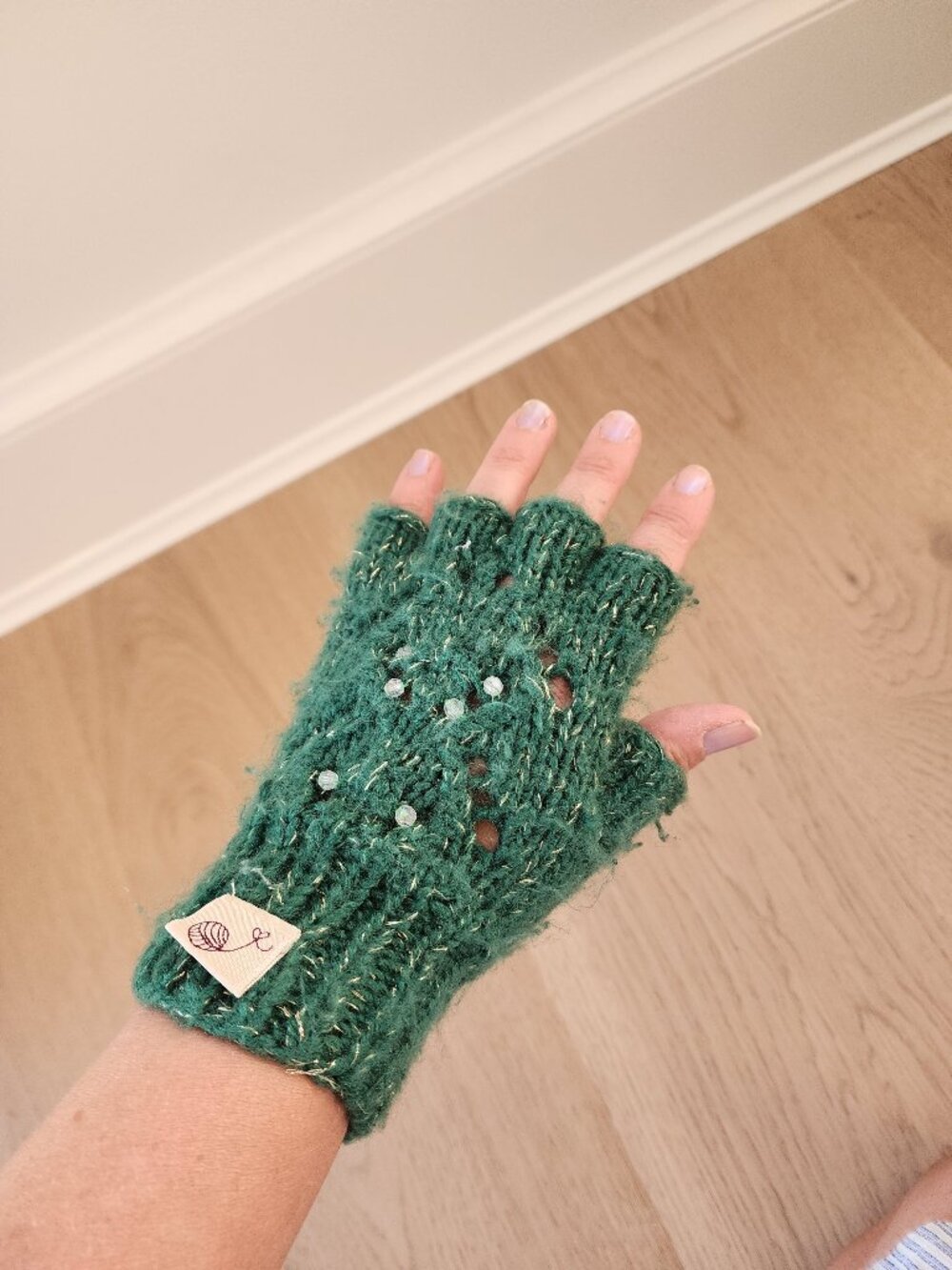 Cute fingerless green knit gloves